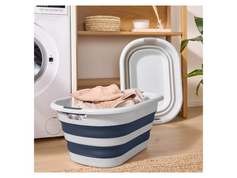 Opvouwbare wasmand en wasbak in modern design.