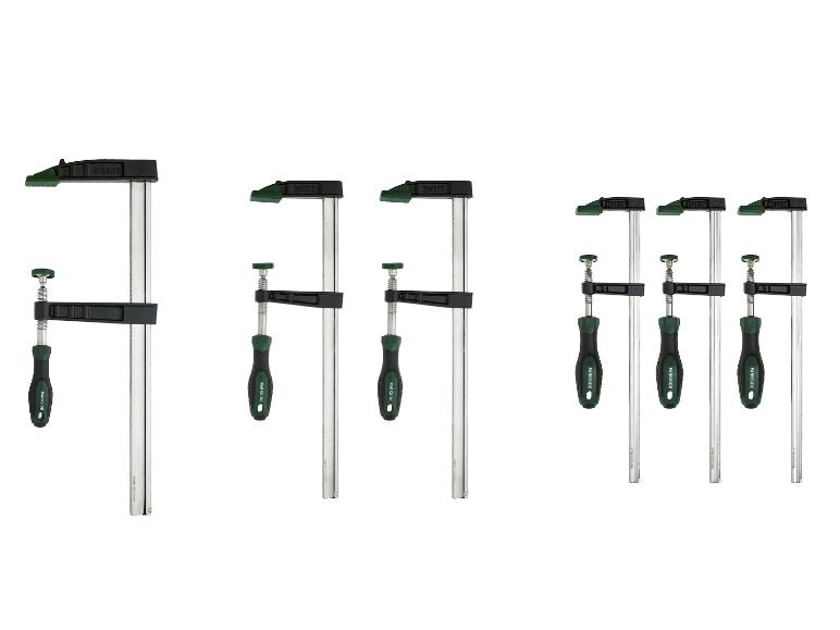 Set van 6 lijmklemmen in verschillende maten met groene en zwarte handvatten.