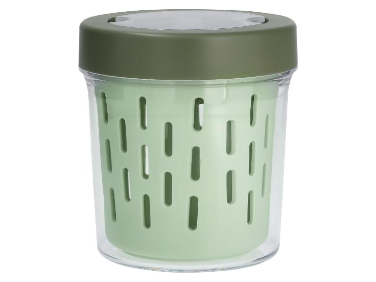 Groene voedselcontainer met transparante buitenkant en donkergroen deksel