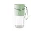 Groene SilverCrest draagbare blender met transparante container en handvat.