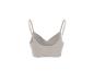 Naadloze geribbelde beige crop top met verstelbare bandjes.