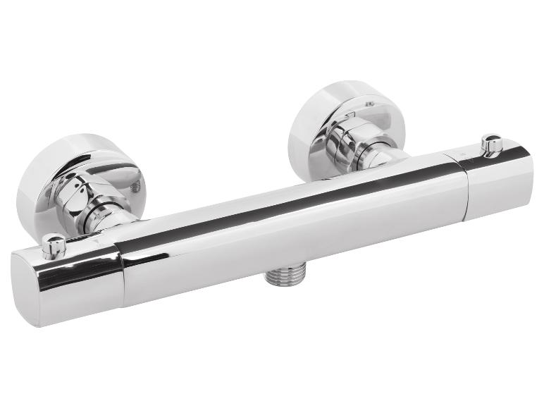 Verchroomde thermostaatische douchekraan met ronde grepen.