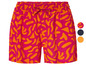 Een roze korte broek met een oranje abstract motief.