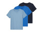Drie effen T-shirts in lichtblauw, donkerblauw en blauw.