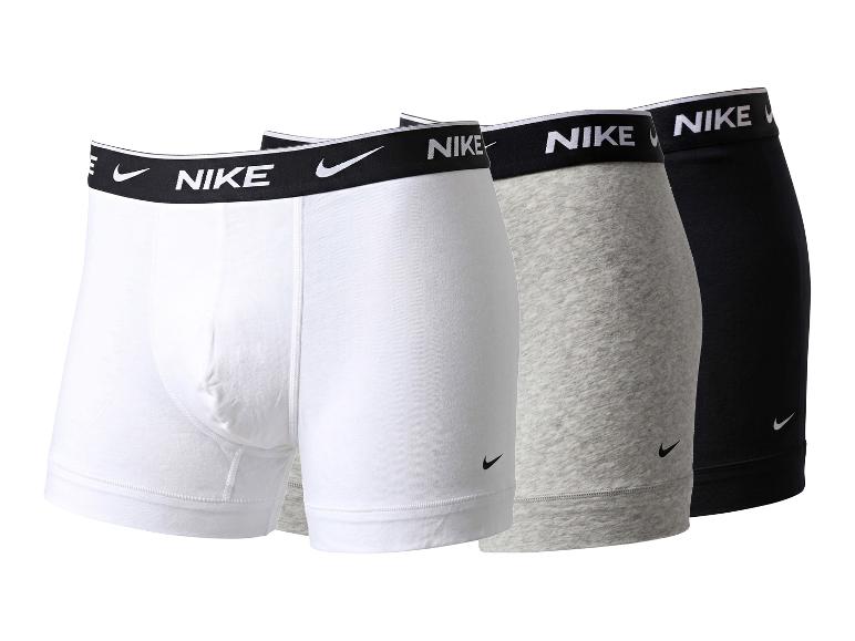 Driepak herenboxershorts in wit, grijs en zwart met elastische tailleband.