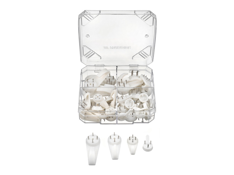 Een set van witte haakjes voor aan de muur, in een doorzichtige verpakking.