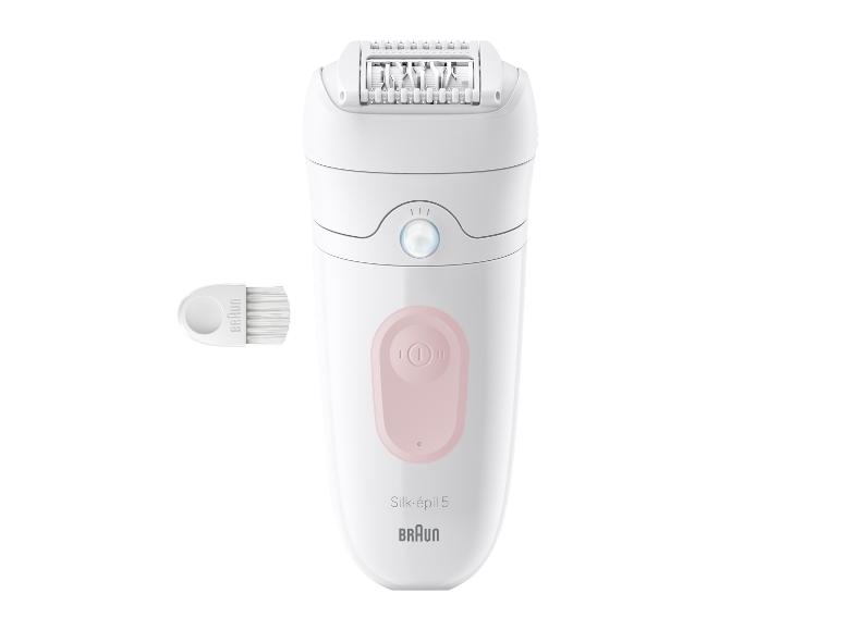 Elektrische epilator met een roze bedieningspaneel en een reinigingsborsteltje.