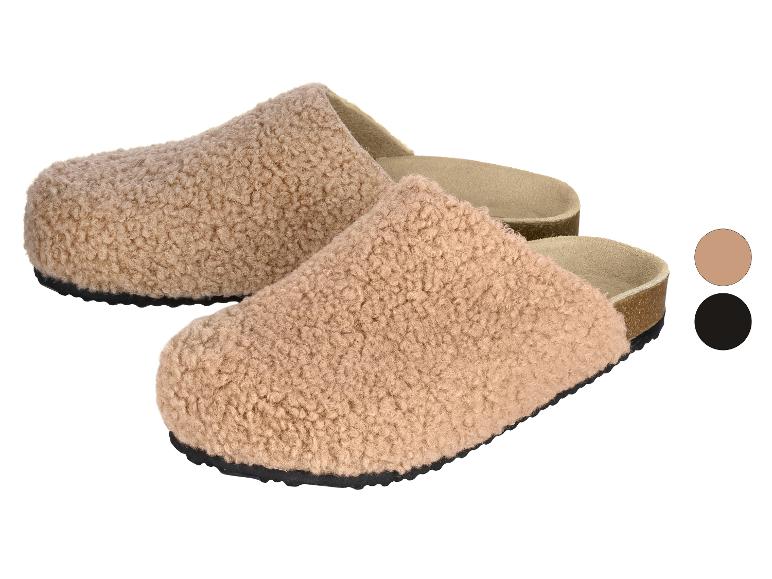 Comfortabele teddy fleece pantoffels met kurkzool, verkrijgbaar in beige en zwart.