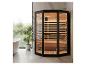 Moderne infraroodsauna met glazen deur en houten interieur in een badkamer