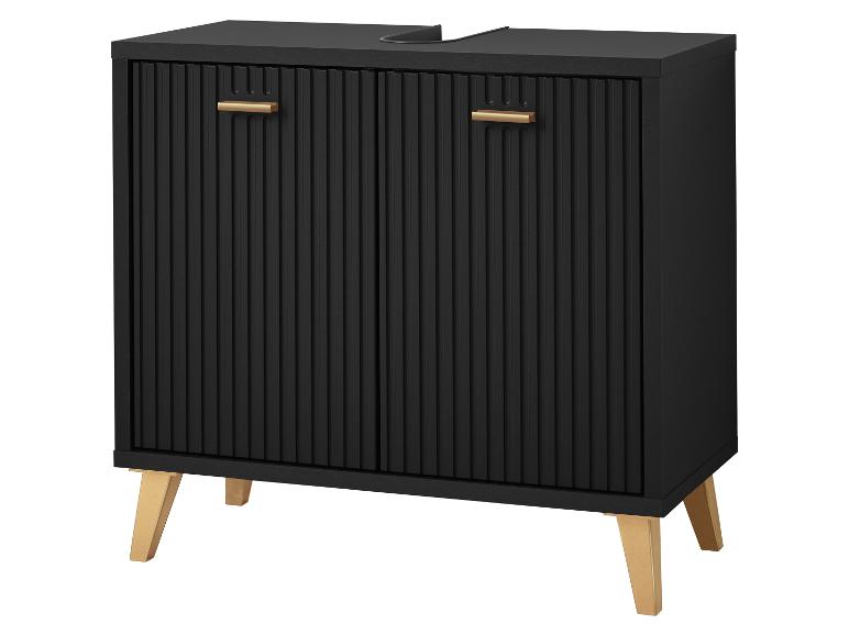 Zwarte badkamerkast met geribbelde deuren, gouden handgrepen en houten poten.