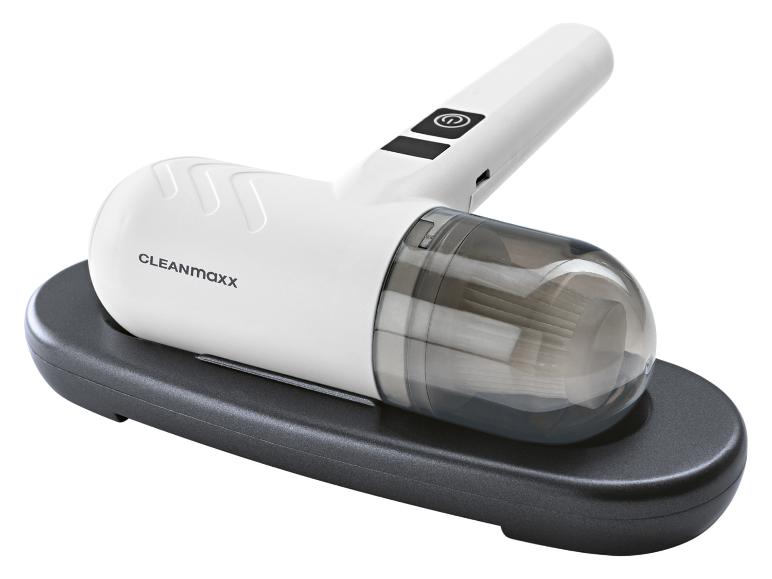 Witte kruimeldief met zwart oplaadstation.