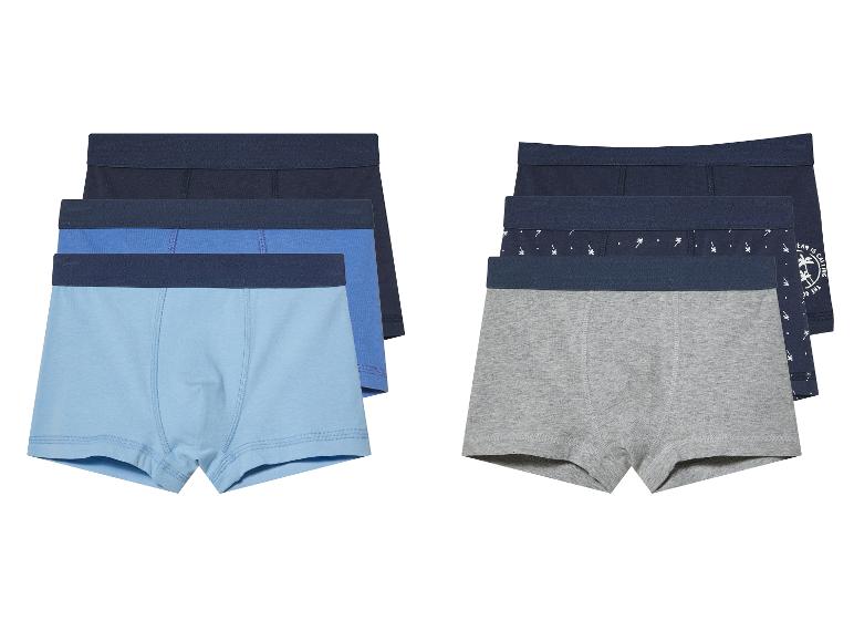 Boxershorts voor jongens: blauw, grijs en donkerblauw met printjes.
