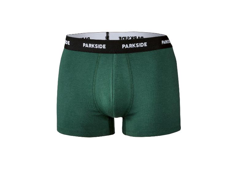 Donkergroene katoenen boxershort met zwarte elastische tailleband en witte tekst.