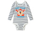 Witte baby romper met zwarte strepen en een Tazmaniaanse duivel print.