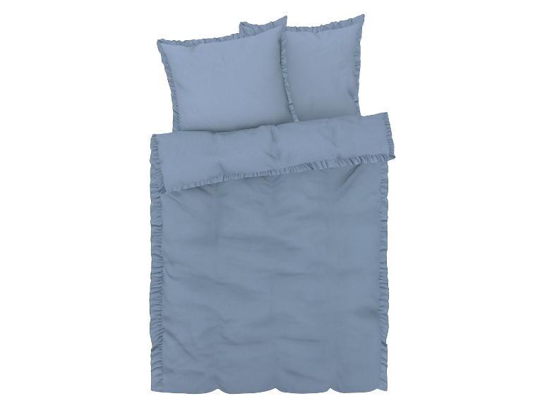 Lichtblauwe beddengoedset met ruches.