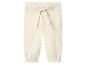 Crèmekleurige mousseline broek met trekkoord in de taille