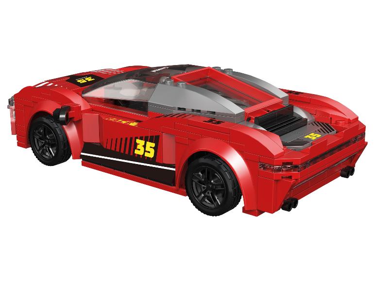 Rode speelgoedraceauto met nummer 35 en transparant dak.