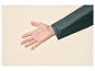 Open hand met donkergroene jas mouw