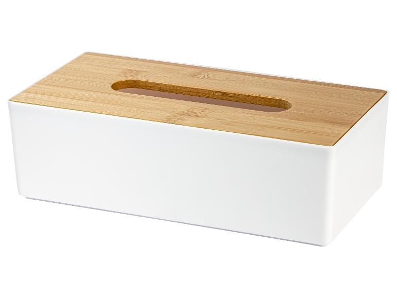 Witte tissuebox met een lichtbruin houten deksel en een ovale opening.
