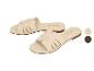 Dames beige platte sandalen met gevlochten bandjes.
