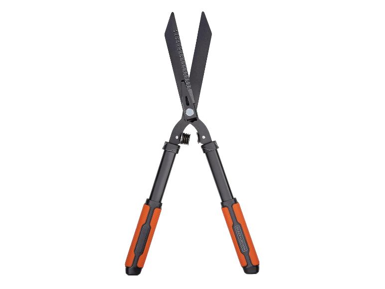 Heggenschaar met oranje handvatten