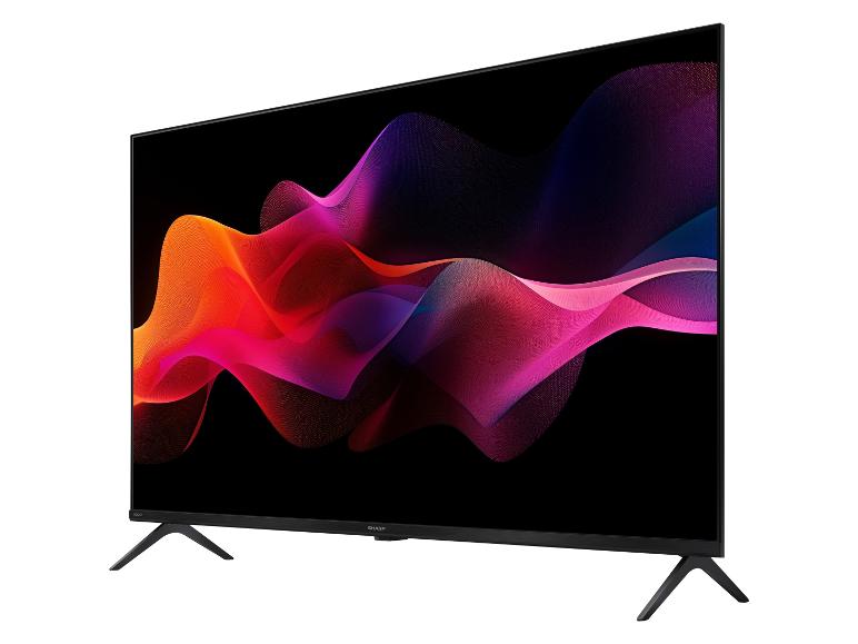 Sharp televisie met zwart scherm en golvende vormen in levendige kleuren