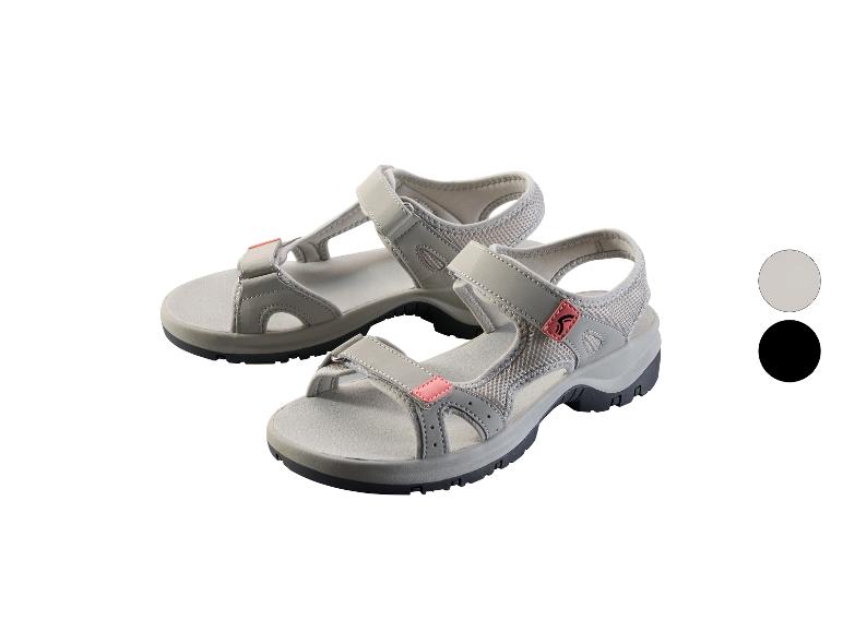 Grijze sandalen met roze accenten en zwarte zolen, met kleurstalen in grijs en zwart.