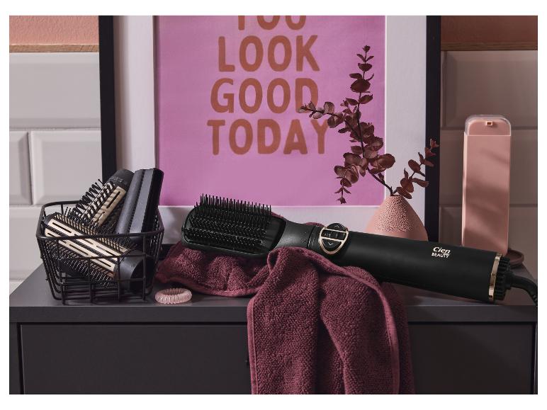 Cien Beauty föhn borstel op een badkamermeubel.