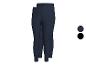 Twee paar donkerblauwe kinderleggings, één paar zwarte leggings.