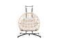 Wicker hangstoel met beige kussens en zwart metalen frame