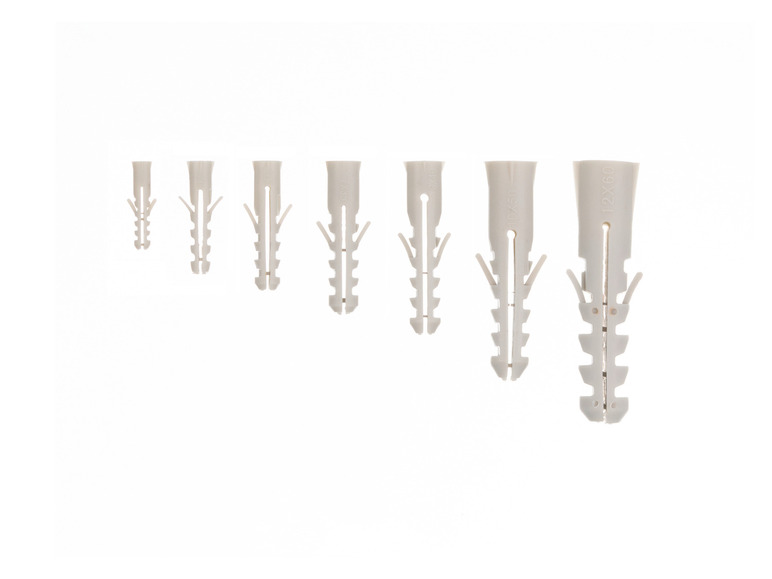 Assortiment witte kunststof pluggen voor bevestiging in de muur.