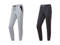 Twee paar joggingbroeken, een grijze en een zwarte.