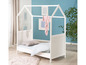 Een wit kinderbed in de vorm van een huis.