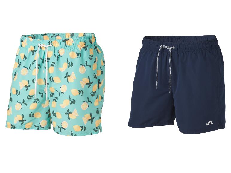 Twee heren zwemshorts: één met citroenprint en één donkerblauw.
