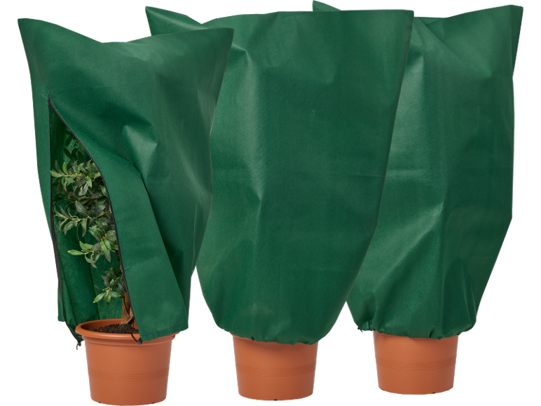 Drie groene beschermhoezen voor potplanten, één met open rits die een plant toont.