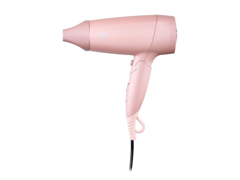 Roze föhn met warmte- en snelheidsinstellingen