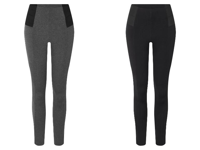Twee leggings, een grijze en een zwarte, met details in de taille.