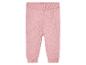 Roze gebreide broek voor baby's.