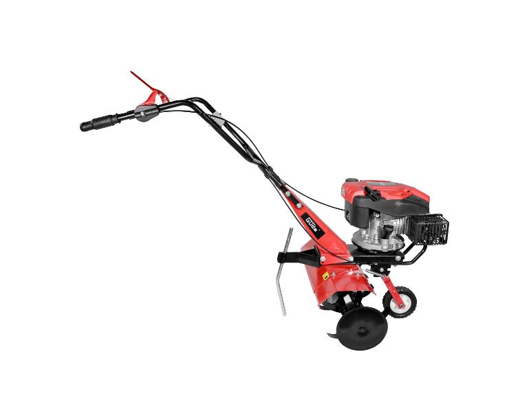 Rode en zwarte grondfrees met benzinemotor en wielen.