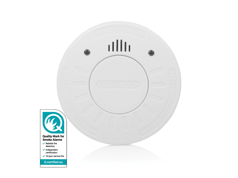Witte rookmelder met 'TEST/HUSH'-knop en kwaliteitskeurmerk voor rookmelders.