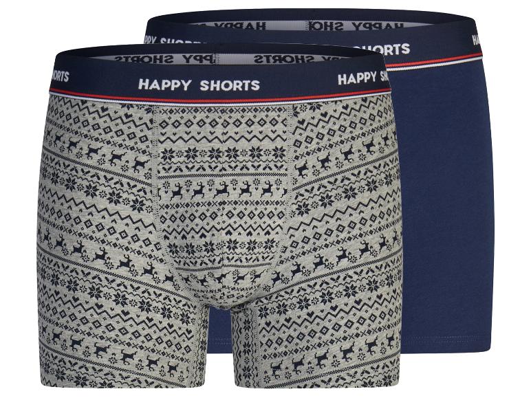 Twee Happy Shorts boxershorts, één grijs met rendierpatroon en één effen marineblauw.