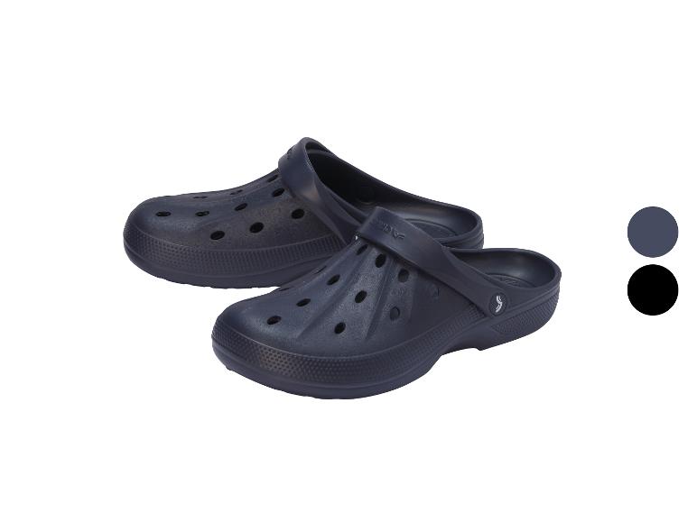 Een paar donkerblauwe tuinklompjes met ventilatiegaten.
