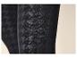 Zwarte panty met pied-de-poulemotief, close-up van de stoftextuur.