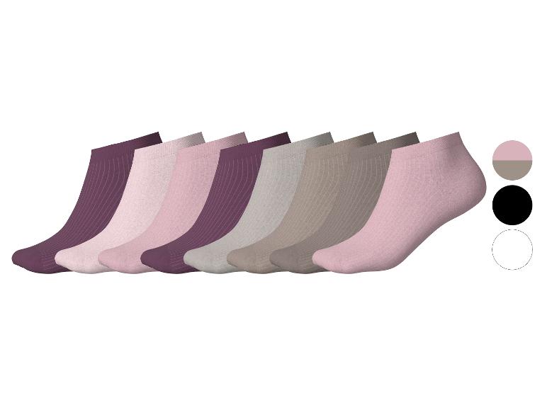 Set van acht paar onzichtbare damessokken in roze, paarse en grijze tinten.