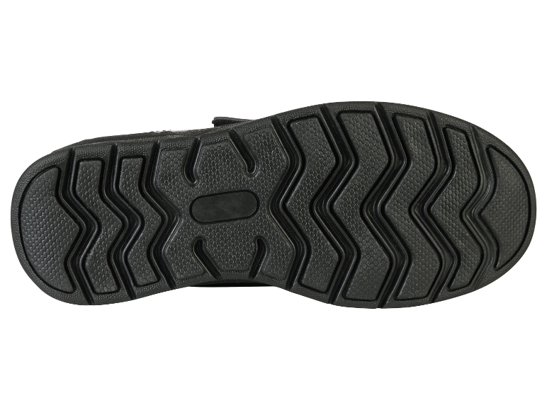 Zool van een kinderschoen met een geribbeld profiel.