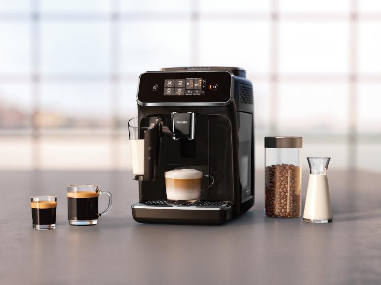 Een Philips koffiezetapparaat met een kop cappuccino, espresso en koffiebonen.