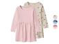Meisjesjurken met lange mouwen, één effen roze en één beige met zwarte hartjes.