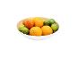 Een kom met sinaasappels, grapefruits en limoenen.