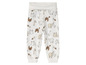 Witte broek met print van schapen, vogels en andere dieren.