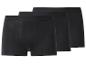 Drie zwarte herenboxershorts, achter elkaar gestapeld.